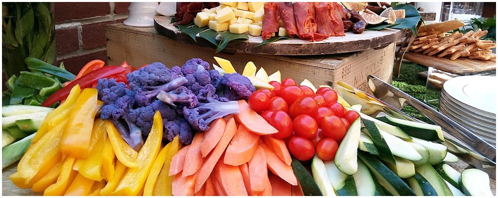 colorful rainbow display of raw vegetable sticks